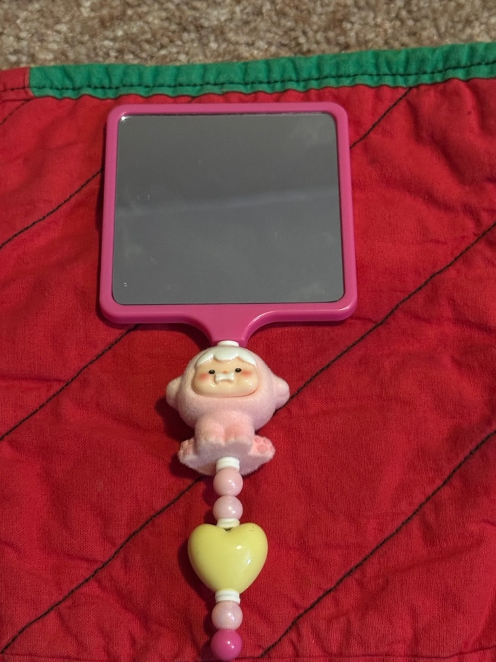 Hand beaded hand mirror featuring cute beads and a cute pinky soft plush toy